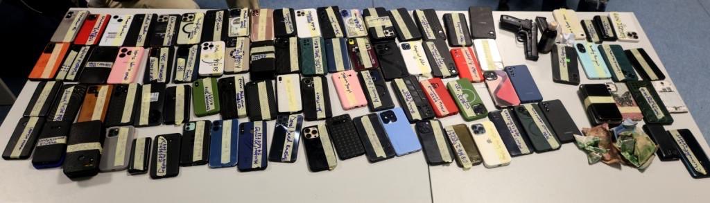 EFCC nabs 74 suspected Yahoo boys in Abuja, recovers rifle pistol 3 Mobile phones recovered from the suspects