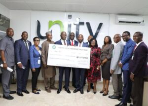 Presenting the cheque at a Managing Director of the NSITF, Barrister Oluwaseun Faleye presented the cheque to the beneficiaries at a brief ceremony at the headquarters of Unity Bank in Lagos on Tuesday,