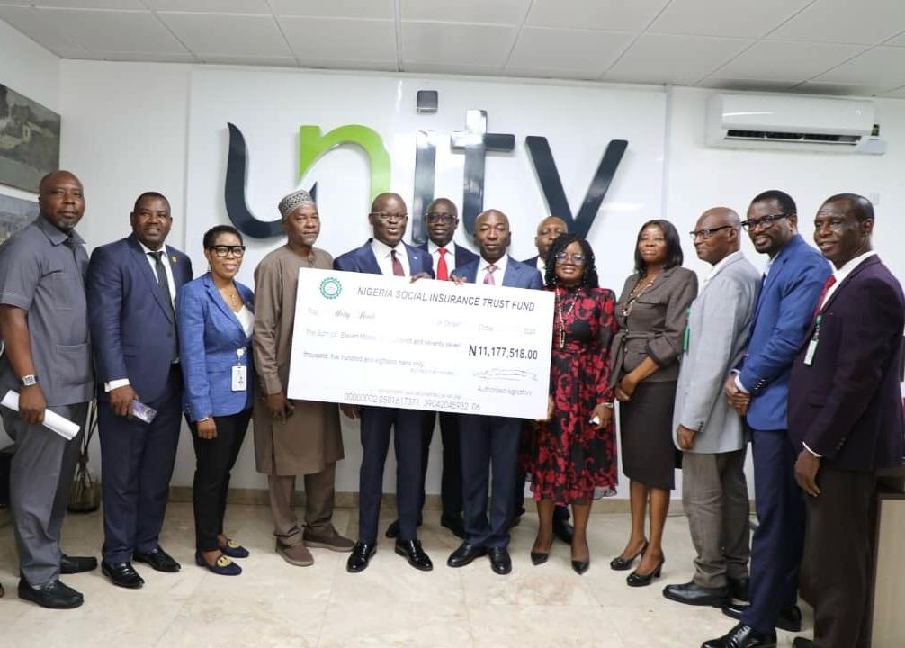 Presenting the cheque at a Managing Director of the NSITF, Barrister Oluwaseun Faleye presented the cheque to the beneficiaries at a brief ceremony at the headquarters of Unity Bank in Lagos on Tuesday,