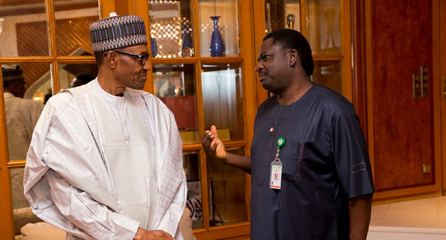 FILE: A file photo of ex-President Muhammadu Buhari and Femi Adesina. Facebook/Femi Adesina