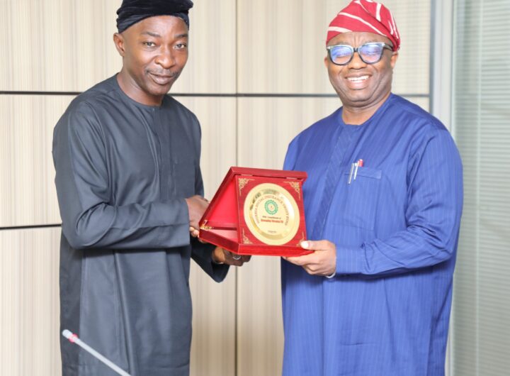 Managing Director of NSITF, Barrister Oluwaseun Faleye, and the NDPC National Commissioner, Dr Vincent Olatunji, during a courtesy visit in Abuja.