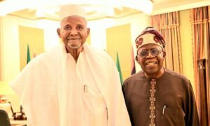 President Bola Tinubu and late Kano business mogul, Aminu Dantata