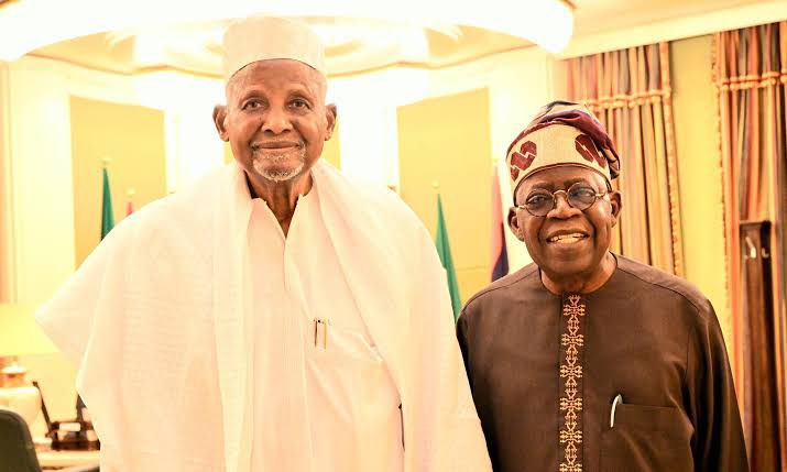 President Bola Tinubu and late Kano business mogul, Aminu Dantata