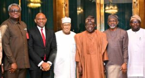 President Bola Tinubu in a group photograph with members of Power Generation Companies (GENCOs) led by Col. Sani Bello (rtd), at the Presidential Villa in Abuja