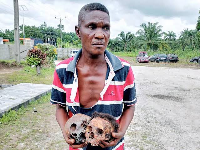 Ritualist with human skull