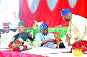 President Bola Tinubu exchanging pleasantry with the new APC chairman, Prof Nentawe Yilwatda during the APC NEC meeting in Abuja