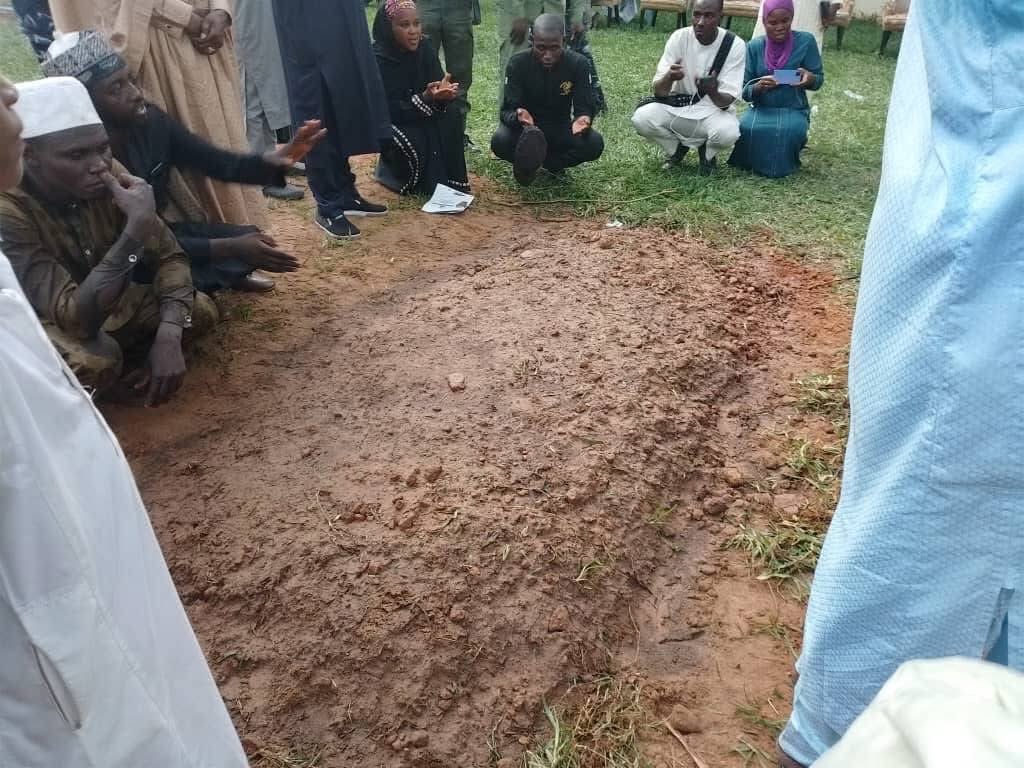 UPDATED: Tears, prayers as Buhari's remains are laid to rest in Daura 3 Mourners at the grave site of late President Muhammadu Buhari