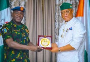 Chief of Air Staff, Air Marshal Hassan Abubakar and Akwa-Ibom, Umo Eno during a courtesy visit to the governor's office in Uyo