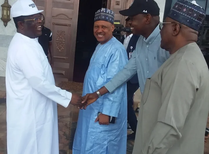David Umahi, receiving the Minister of Information and National Orientation, Alhaji Mohammed Idris during a courtesy visit to him in Abakaliki on Saturday.