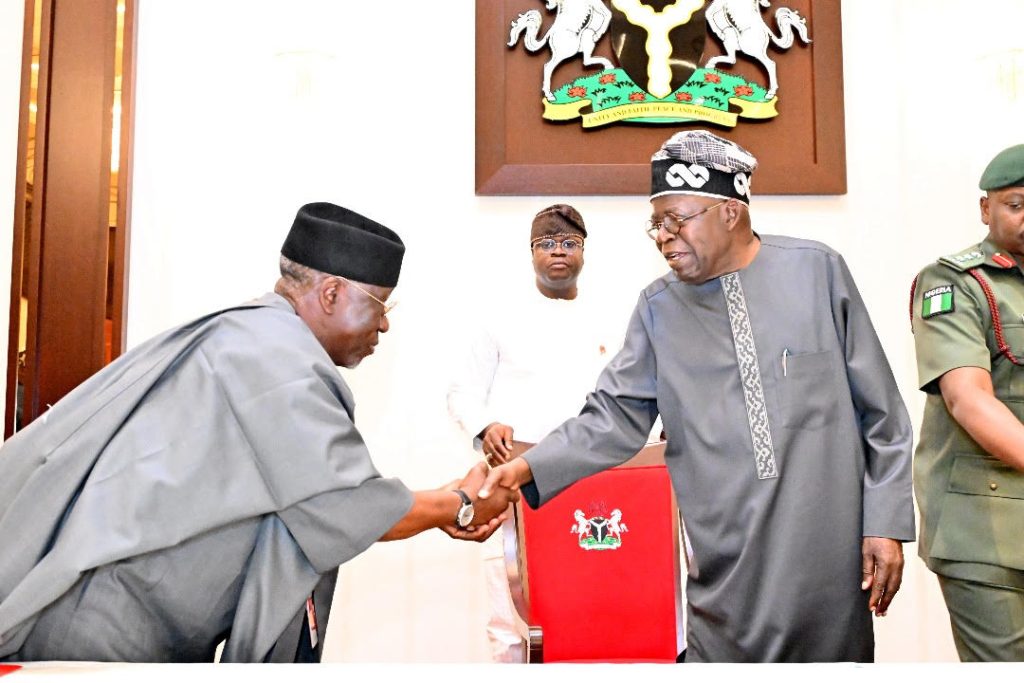 President Bola Tinubu in a handshake with the former Governor of Nasarawa State, Umaru Tanko Al-Makura.