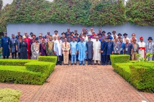 President Bola Tinubu in a group photograph with members of the Presidential Committee on the Ogoni Consultations during a meeting I'm meeting