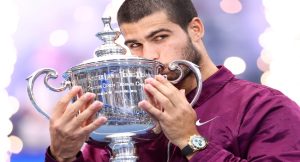 Spain’s Carlos Alcaraz celebrates with his trophy winning over Italy’s Jannik Sinner during their men’s singles final tennis match on day fifteen of the US Open tennis tournament at the USTA Billie Jean King National Tennis Center in New York City, on September 7, 2025. (Photo by CHARLY TRIBALLEAU / AFP)