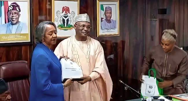Professor Yakubu handing over to Mrs Agbamuche as INEC Acting Chairman
