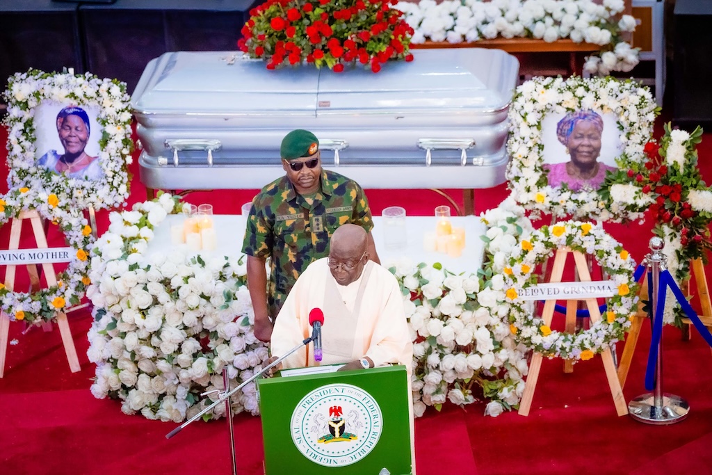 "A president who feasts while the people mourn" – Atiku slams Tinubu’s Plateau visit 2 President Bola Tinubu speaking on Saturday during the funeral service of Lydia Yilwatda Goshwe, mother of the National Chairman of the All Progressives Congress (APC), Dr. Nentawe Yilwatda.