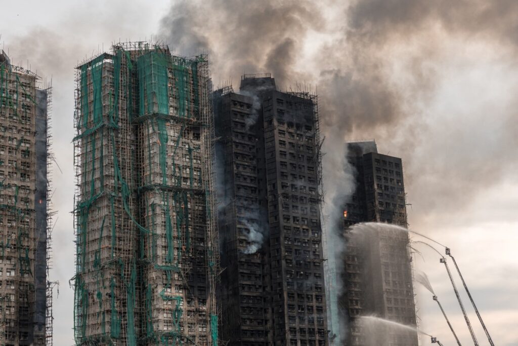 Horror in Hong Kong: Over 250 remain missing after deadliest blaze in decades 2 Smoke rises from apartments after a major fire swept through several blocks at the Wang Fuk Court residential estate in Hong Kong’s Tai Po district on November 27, 2025. DALE DE LA REY / AFP
