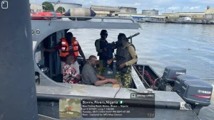 Nigerian Navy troops rescue sinking boat passengers