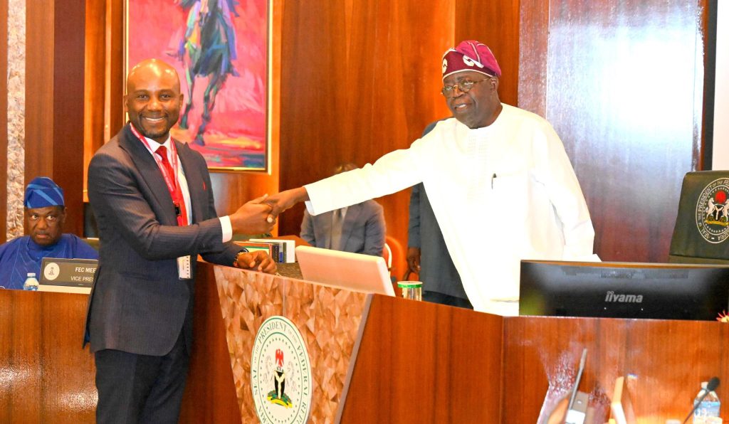 President Bola Tinubu in a handshake with Minister of Science and Technology, Kingsley Udeh shortly after the swearing in ceremony. Photo credit: State House
