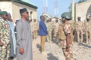 Borno State Governor, Prof. Babagana Zulum addressing armed military troops in Damboa