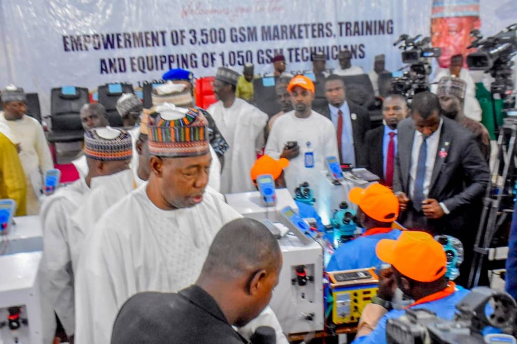 Borno State Governor, Babagana Zulum interacting with the beneficiaries of the youth empowerment scheme