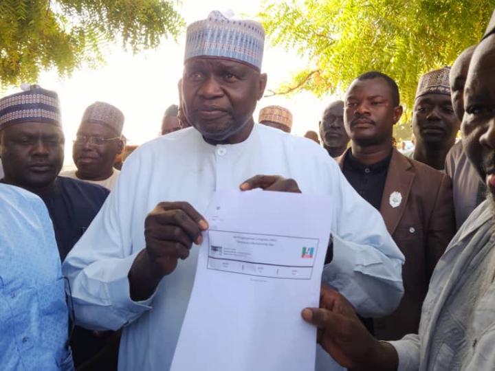Borno SSG Bukar Tijjani picks APC e registration card