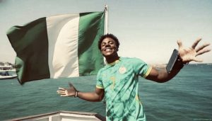 American YouTube sensation IShowSpeed celebrates his 21st birthday in Nigeria, smiling for the camera as fans and well-wishers surround him during the lively outing.
