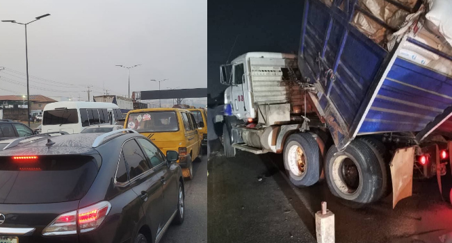 Motorists stranded as fully-loaded truck overturns on Otedola Bridge