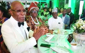 R L President Olusegun Obasanjo his wife Chief Mrs Bola Obasanjo and Mr. Leo Stan Ekeh at the event