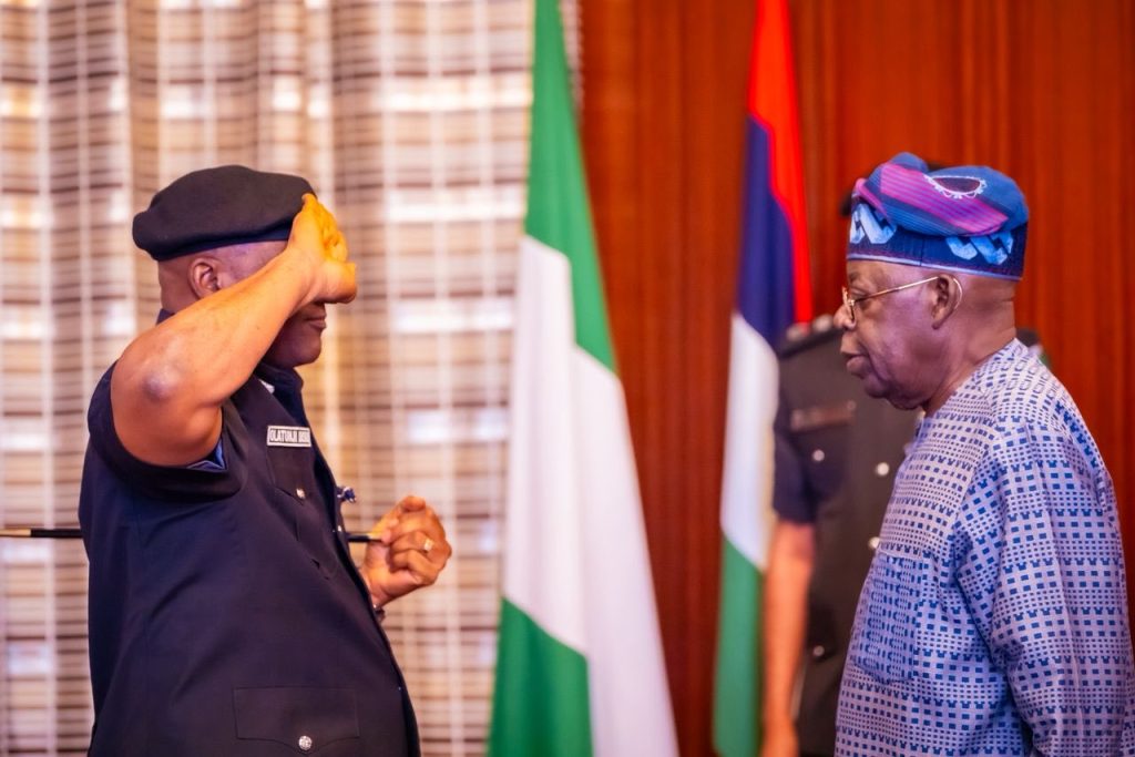 You have my full support, restore peace and security – Tinubu tasks acting IGP Disu 4 President Bola Tinubu and the new acting IGP Olatunji Disu. Photo credit: State House Abuja