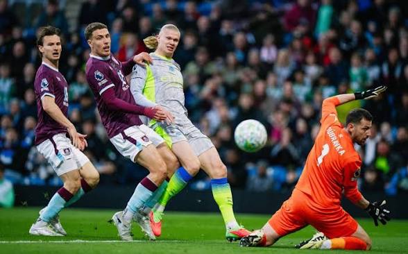 Haaland fires Manchester City level with Arsenal as Burnley relegation is sealed