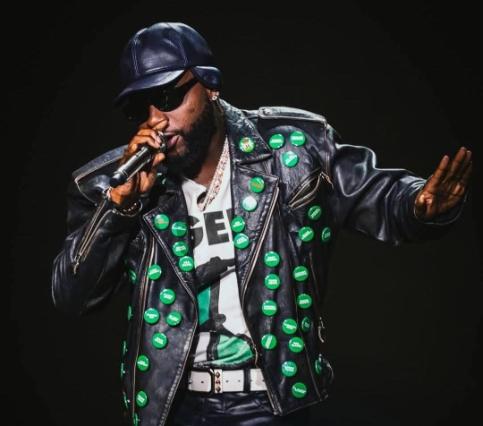 Davido wears jacket bearing names of abducted Oyo pupils, teachers at FIFA World Cup countdown concert