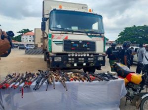 Lagos police intercept truck loaded with 47 sacks of military camouflage, arrest 4 suspects