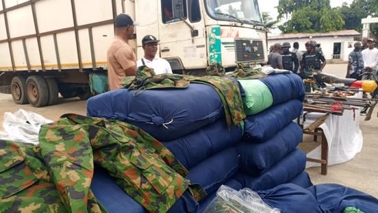 Lagos police intercept truck loaded with 47 sacks of military camouflage, arrest 4 suspects