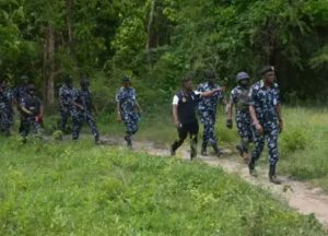 Police raid forest