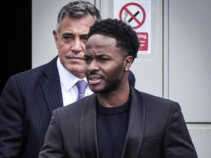 Former Manchester City star Sterling banned from driving after dangerous driving Former Manchester City star Raheem Sterling has been banned from driving after pleading guilty to dangerous driving, possession of nitrous oxide and failing to provide a specimen. Sterling appeared at Basingstoke Magistrates’ Court on Tuesday over a May 28 crash involving his Lamborghini Urus. The 31-year-old admitted driving dangerously on the M25, M3, A327 and Minley Road before the vehicle left the road near the Minley Interchange in Hampshire during morning rush hour. The court heard that several motorists reported the car after seeing it being driven erratically. One witness said Sterling was swerving between lanes while inhaling nitrous oxide from a balloon. Police later found six canisters of the substance in the vehicle, including two 670g canisters on Sterling’s lap. He also failed a roadside impairment test and declined to provide a blood sample after being taken into custody. Sterling later told police that he “had a problem” with nitrous oxide. No other vehicle was involved in the crash and no injuries were reported. Sterling was disqualified from driving and granted bail. He will return to court on November 25 for sentencing, with the offences carrying a possible prison sentence of up to two years. Once one of English football’s biggest names, Sterling is currently without a club after leaving Feyenoord at the end of last season. He began his Premier League career at Liverpool before joining Manchester City in 2015, where he won four Premier League titles. He later played for Chelsea and spent the 2024/25 season on loan at Arsenal before moving to Feyenoord. His latest legal troubles come after a difficult period in his career, with Sterling’s future in football already uncertain as he remains a free agent.